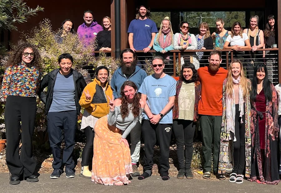 The CPACT cohort gathered together outdoors in a garden setting